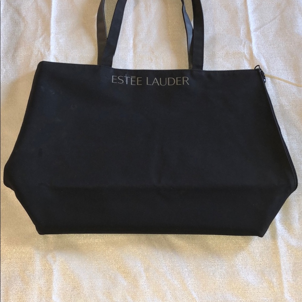 Black and gray reversible Estée Lauder tote